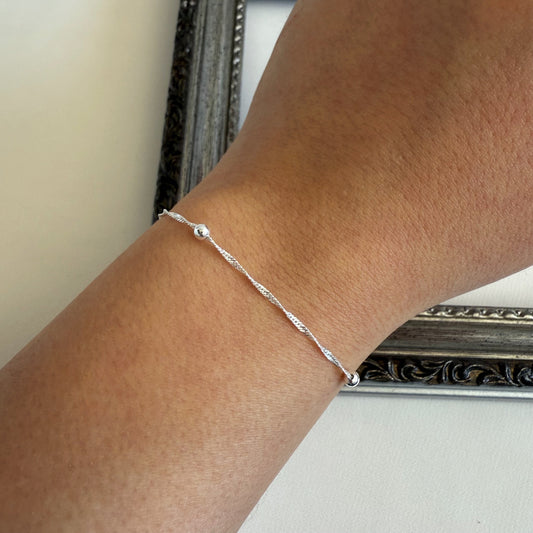 Pulsera Torcida con Esferas