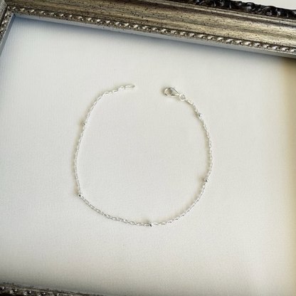 Pulsera Tradicional con Esferas Achatadas