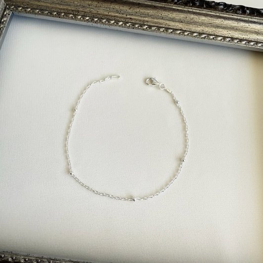 Pulsera Tradicional con Esferas Achatadas